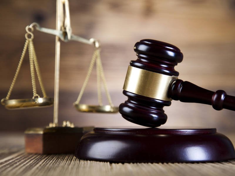 Police arraign two for allegedly stealing bags of biscuits