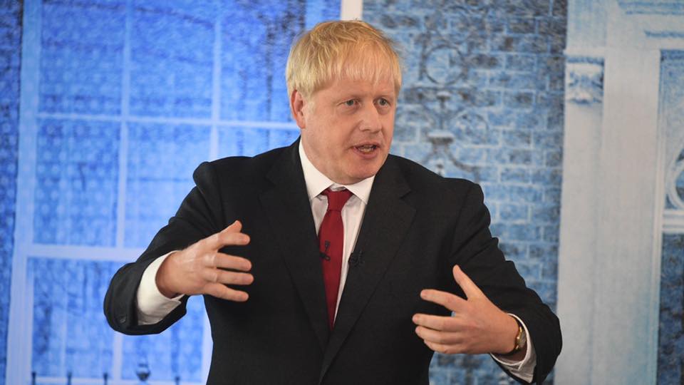 British PM vows to pursue Brexit deal after new blow