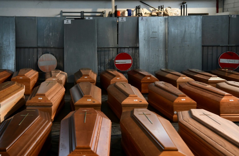 Italy's Italy's Dead Overwhelm Morgues As Virus Toll Tops 8,000