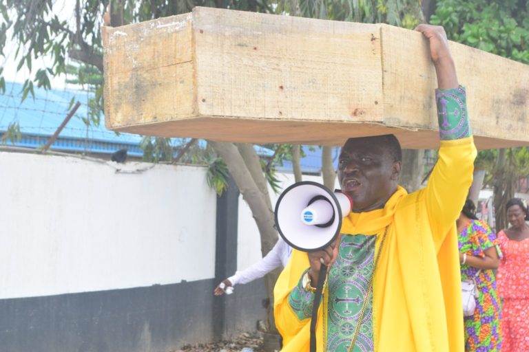 ‘God Not Happy With Buhari’ – Pastor Protests With Coffin