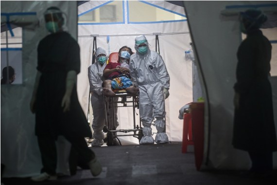 Indonesia Hits Record Of Over 21,000 Daily Virus Infections