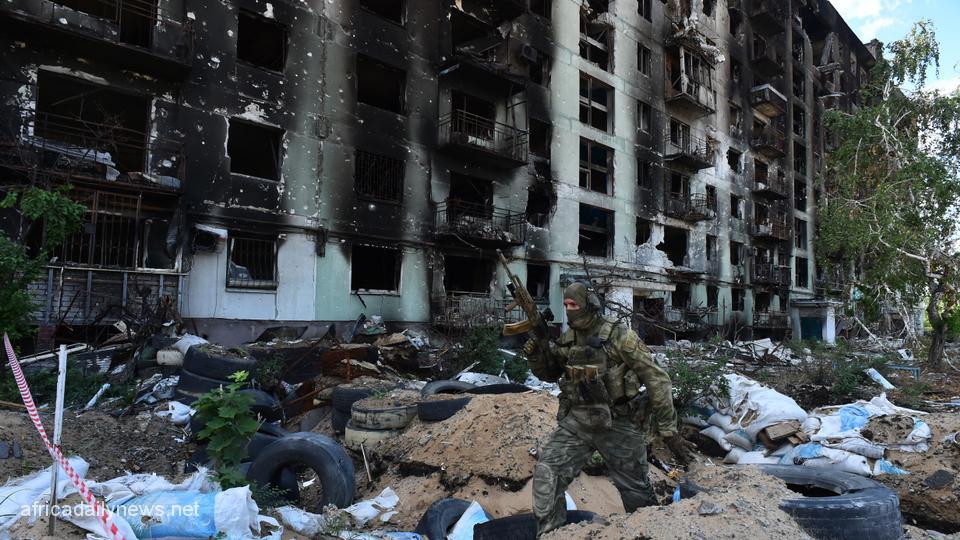 War Death Toll From Missiles On Ukraine Town Climbs To 14