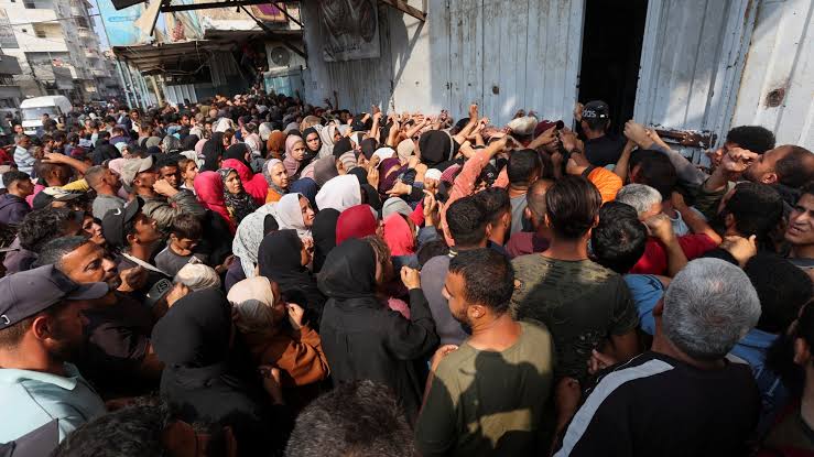 Gaza civilians flee IDF raids while Israelis rally in protest
