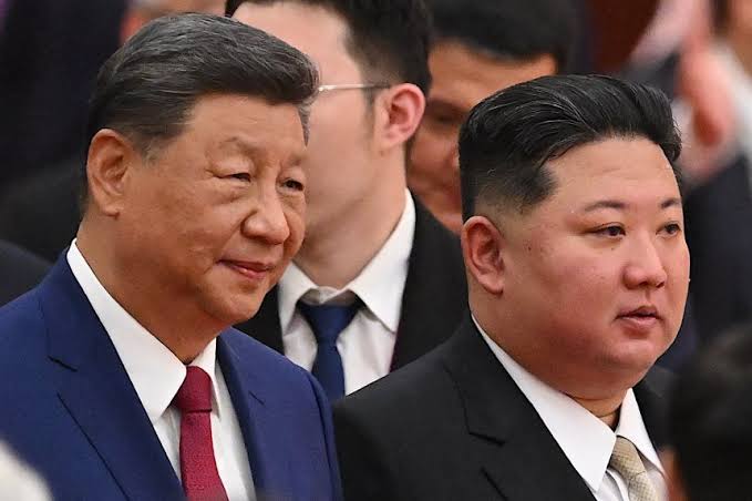 Kim Joins Xi And Putin At Beijing Parade In Show Of Unity