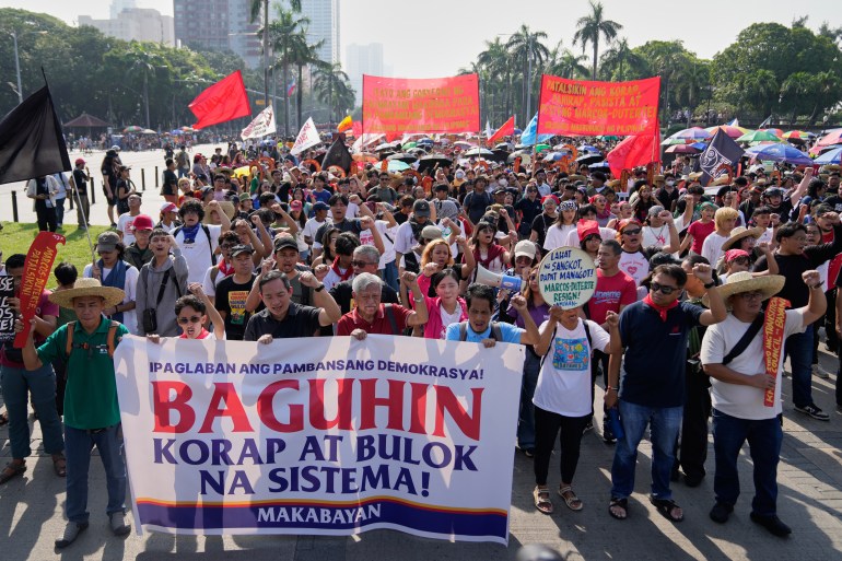 Mass Protests In Manila Demand Marcos Resign Amid Scandal